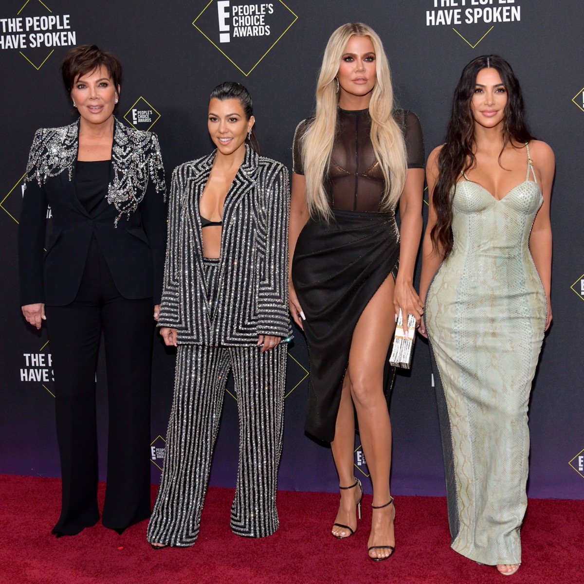 kris jenner, kourtney kardashian, khloe kardashian, and kim kardashian on red carpet