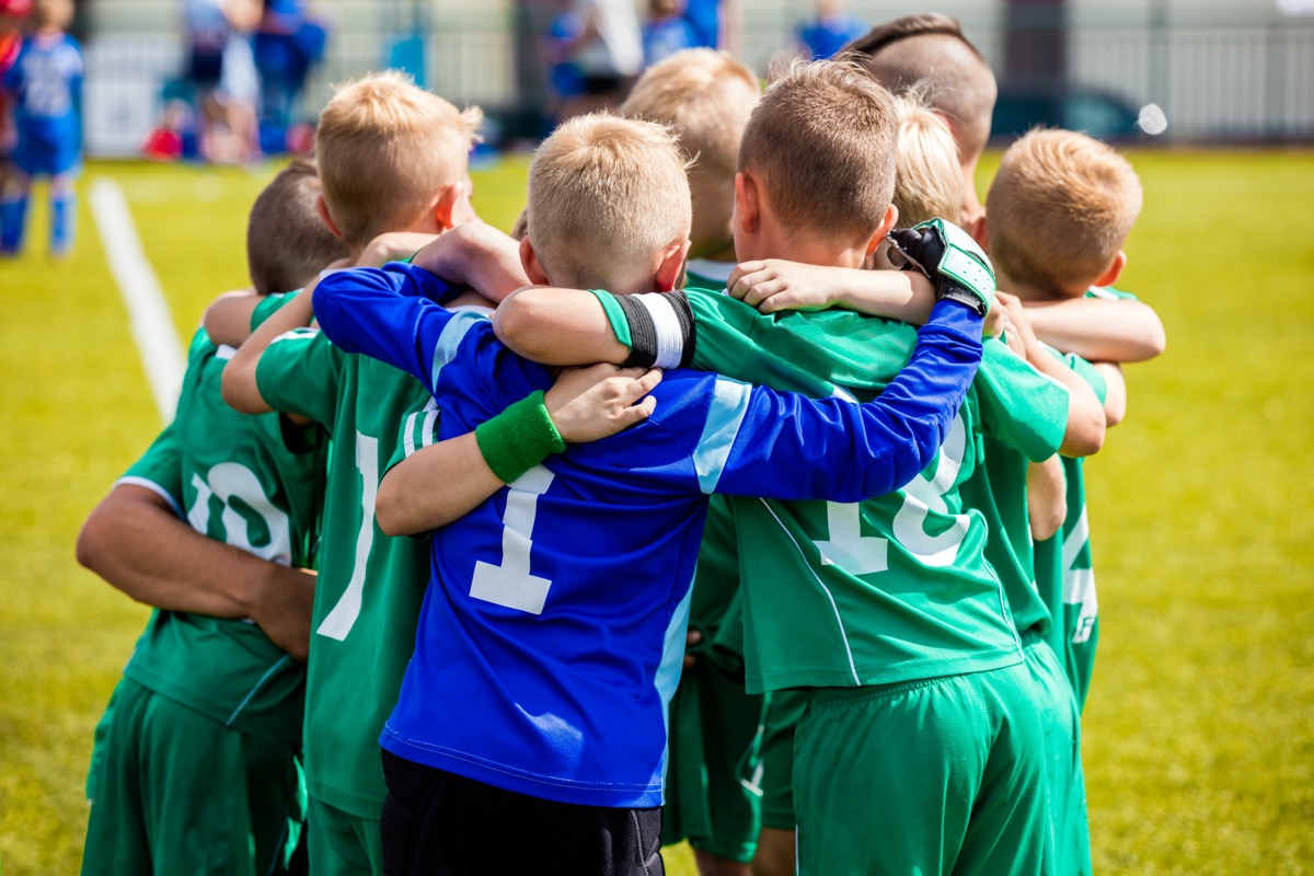 Young football soccer players in sportswear.