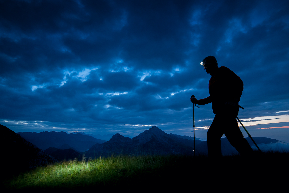 man walking for exercise at night walker