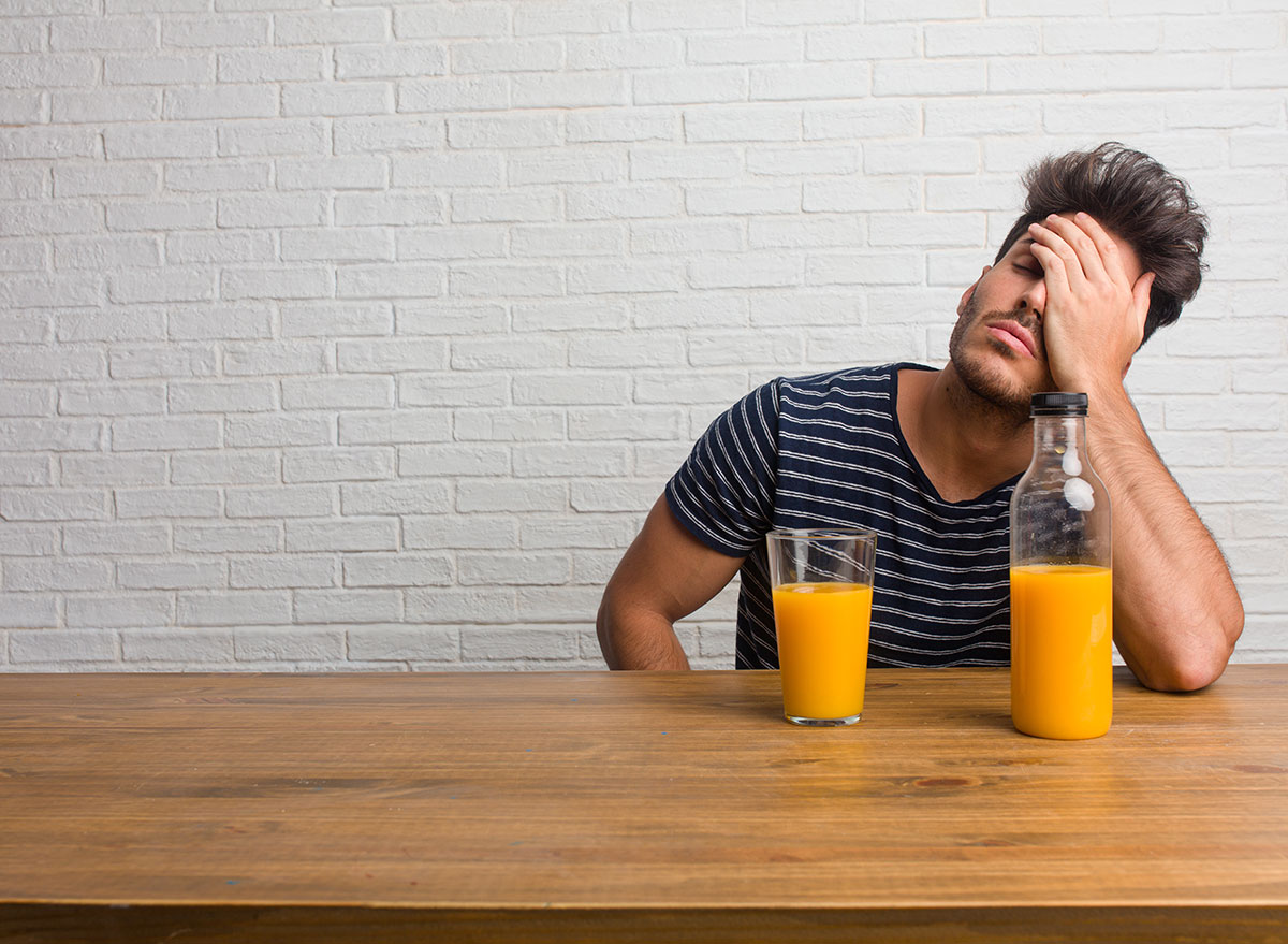 man with orange juice