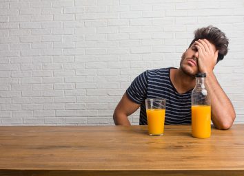 man with orange juice