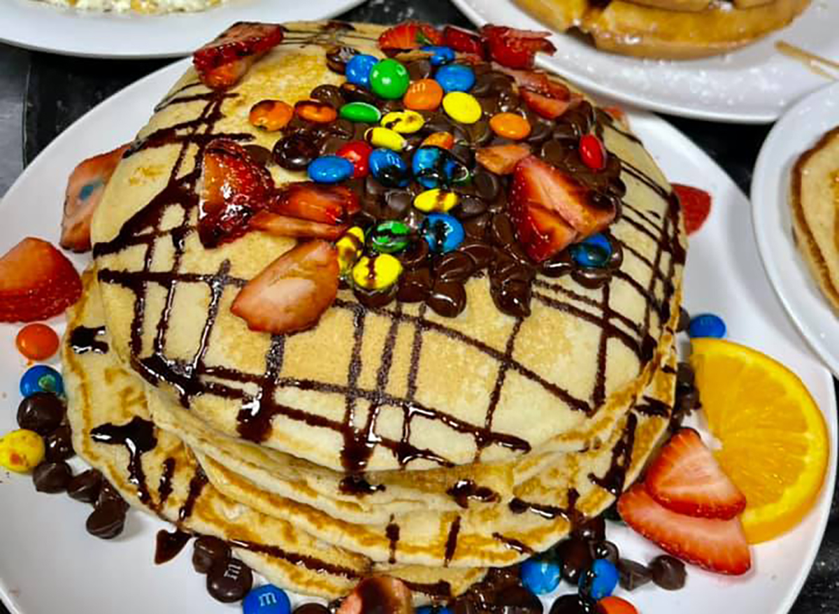 stack of mms pancakes with strawberries