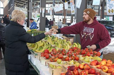 A vendor makes a sale at Detroit's Eastern Market