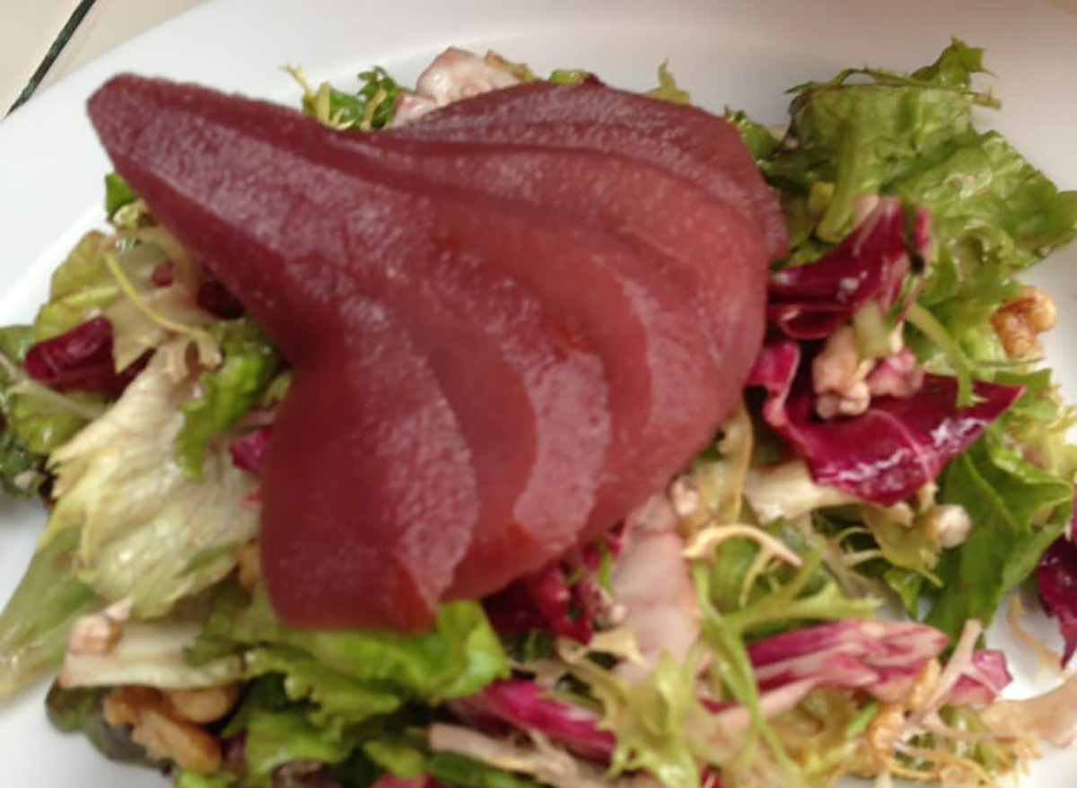 salad topped with poached pears