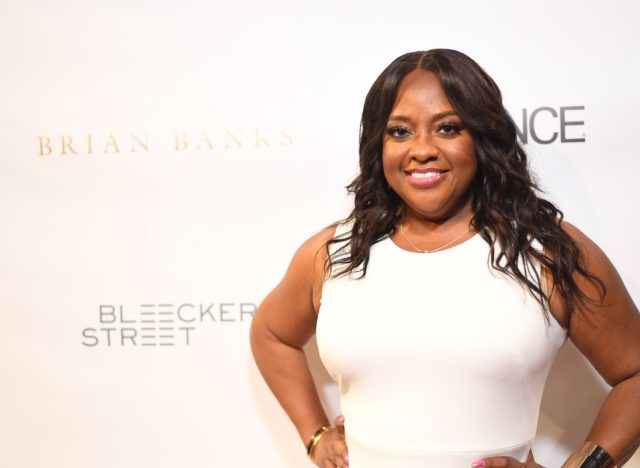 sherri shepherd in white dress on red carpet