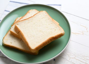 slices white bread on plate