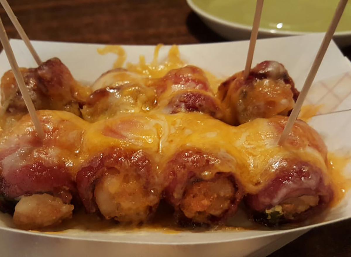 tater tots topped with bacon and cheese