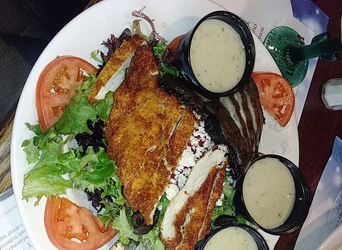 tuscan salad with tomatoes and breaded chicken