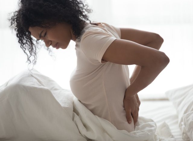 young woman with kidney pain