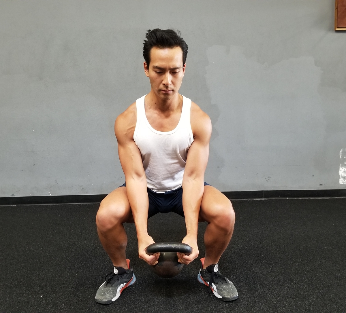 3 Kettlebell Goblet squat and reverse curl