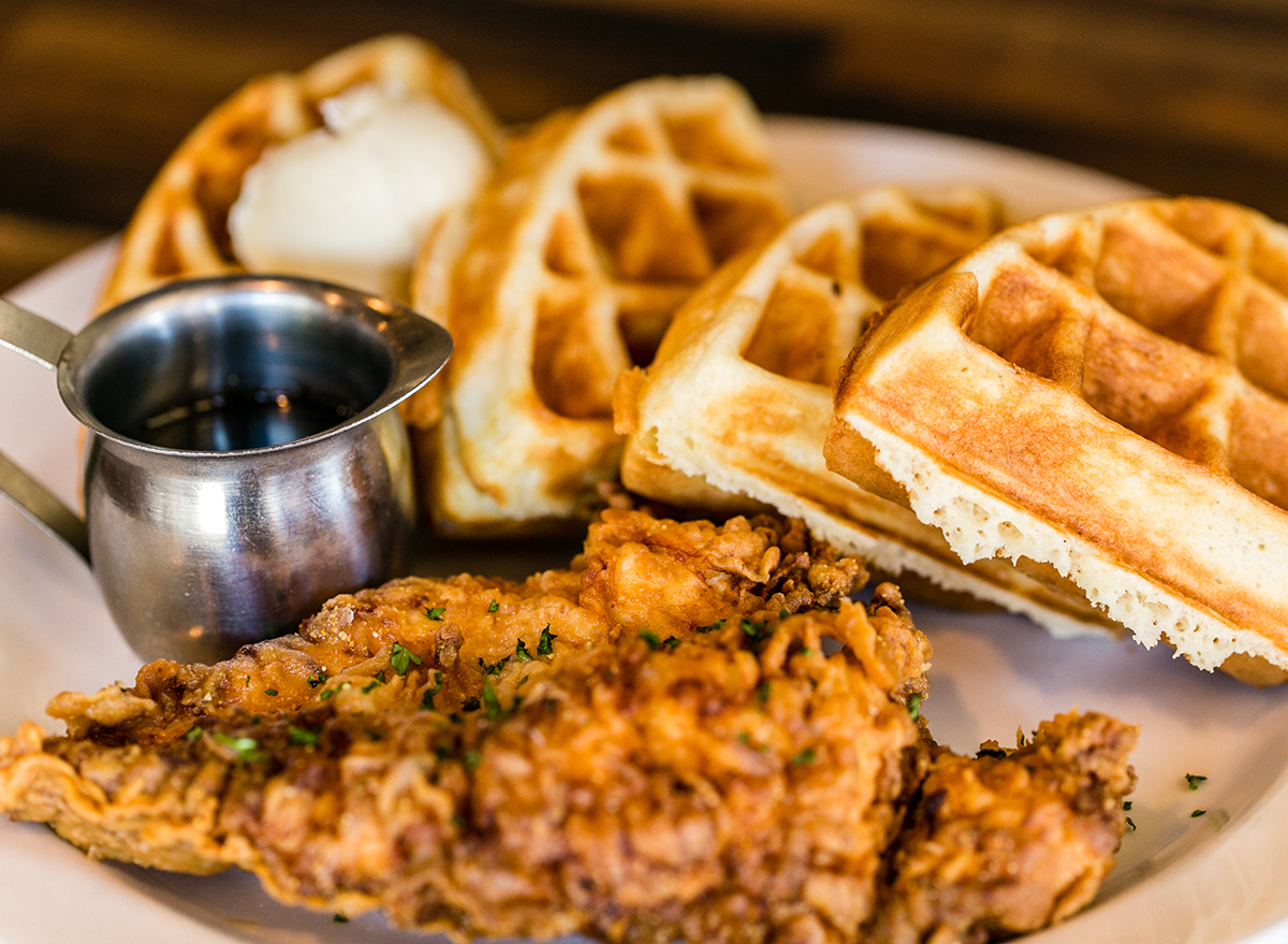 fried chicken and waffles with syrup