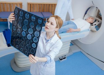 Radiologist looking at the MRI scan images.