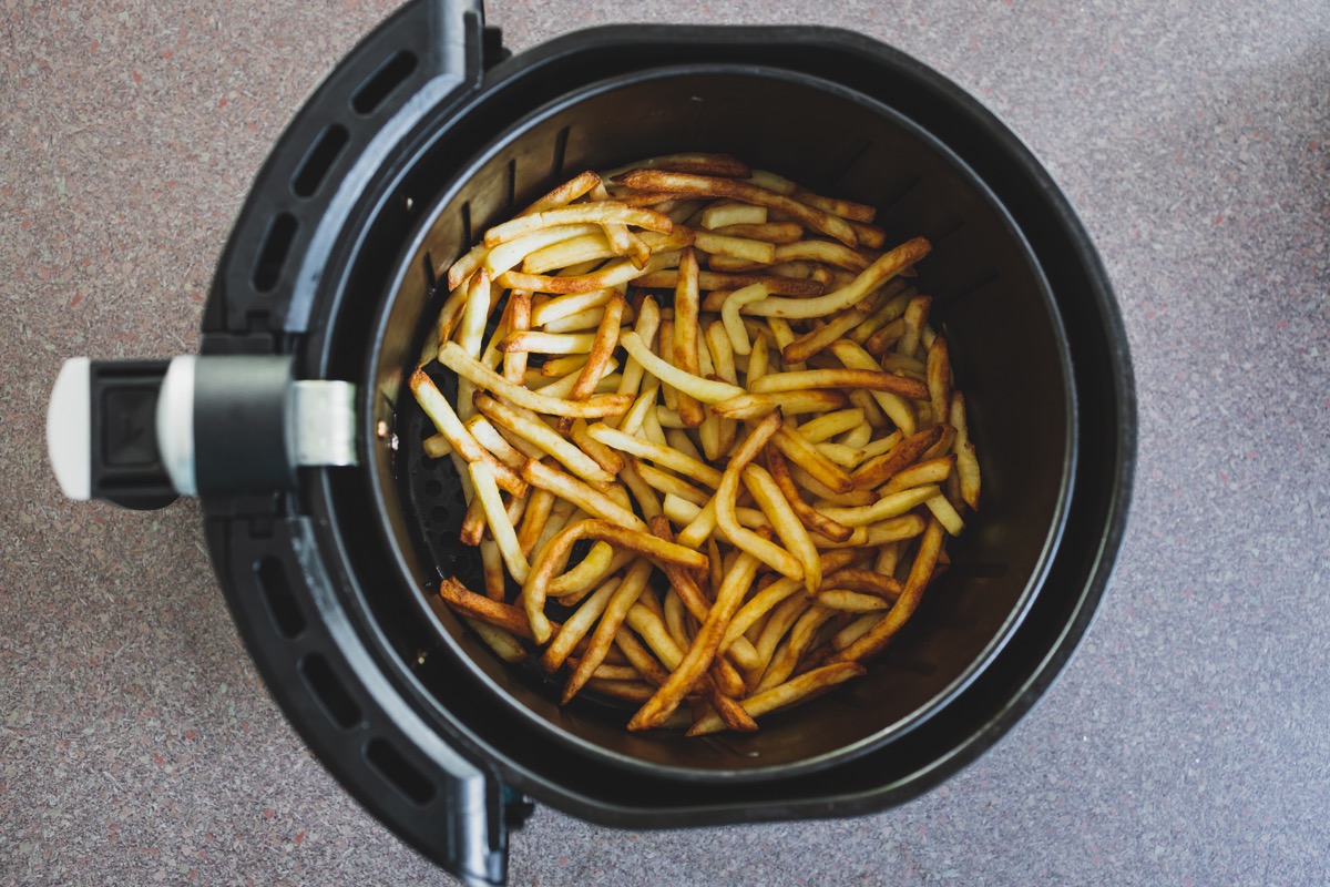 french fries in air fryer basket