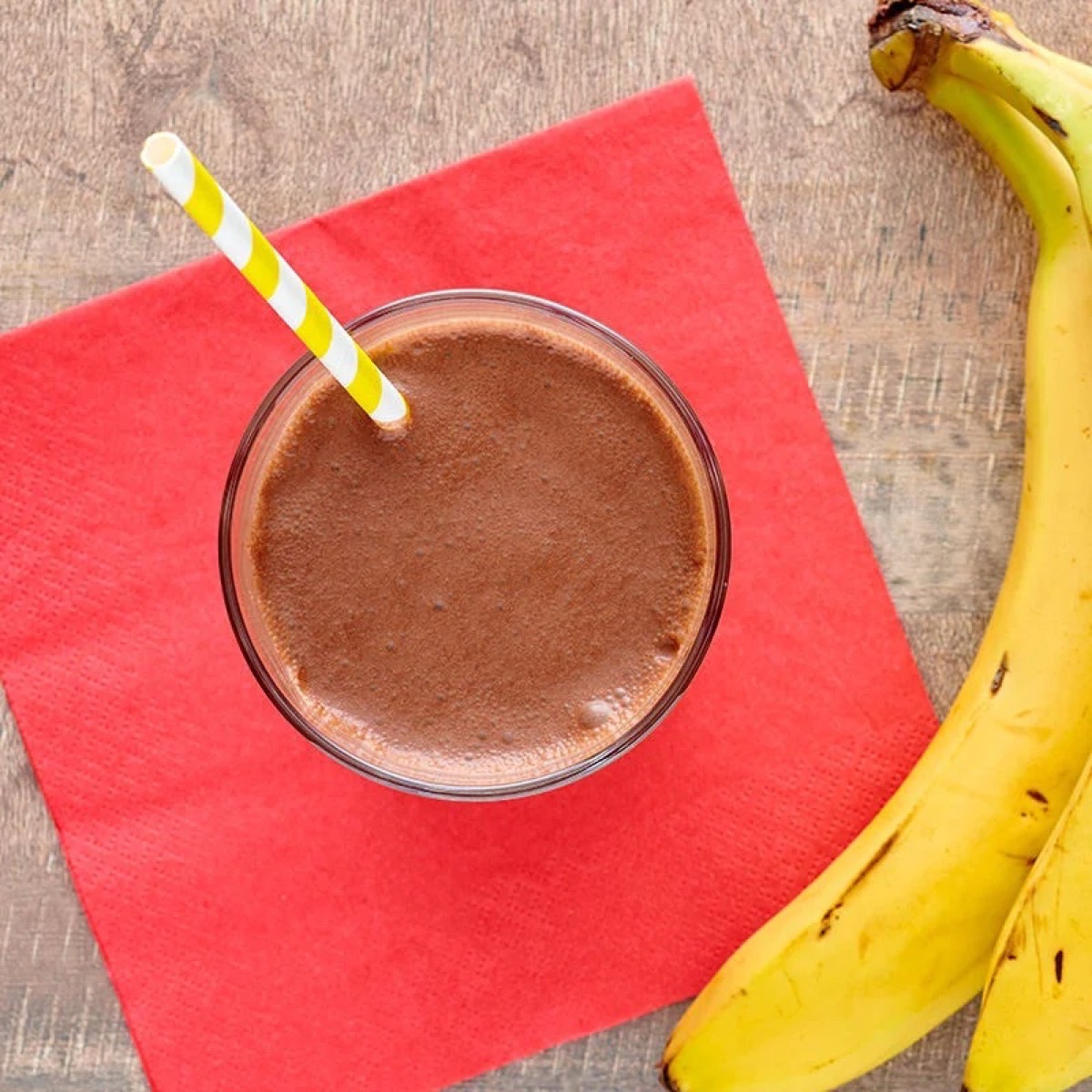 chocolate protein shake next to banana