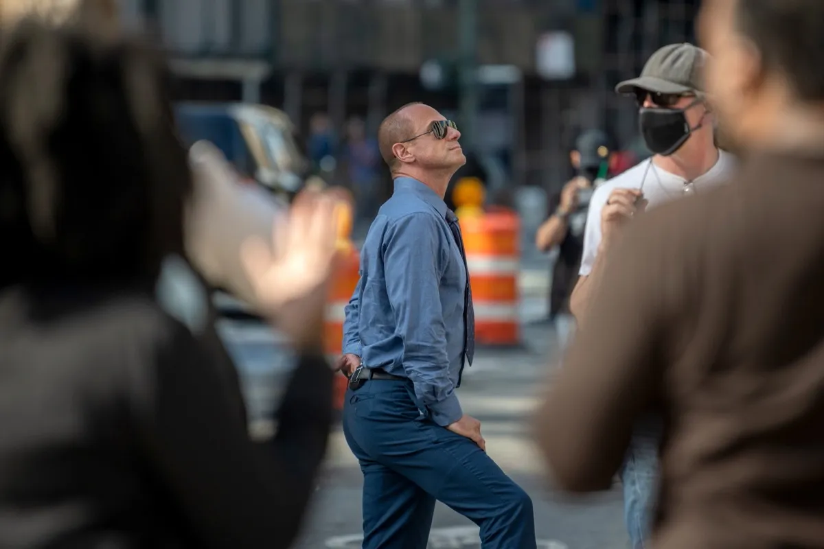 christopher meloni standing outside on a city street