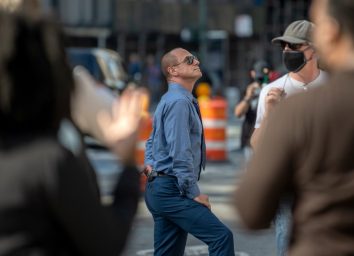 christopher meloni standing outside on a city street