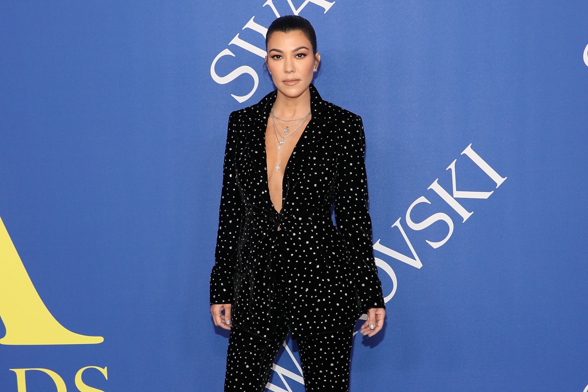 kourtney kardashian in black suit with white spots