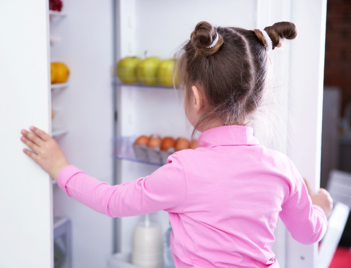 young girl in pink shirt