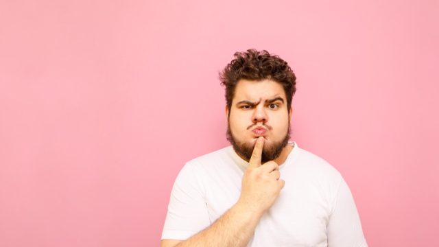Portrait,Of,A,Funny,Curly,Overweight,Man,In,A,White