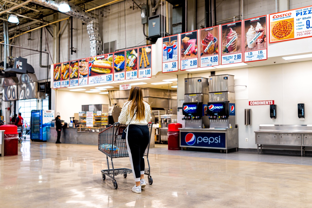 young woman shopping at the costco food court