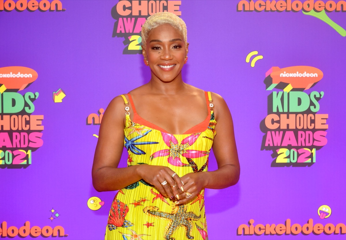 tiffany haddish in yellow dress on red carpet