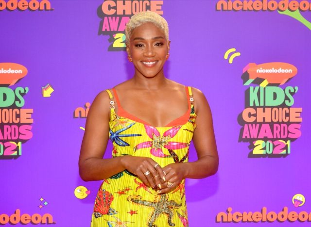 tiffany haddish in yellow dress on red carpet