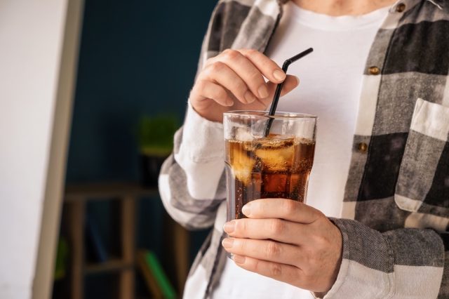 woman drinking soda