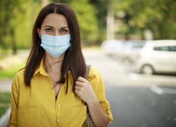 Woman with face protective mask outdoor