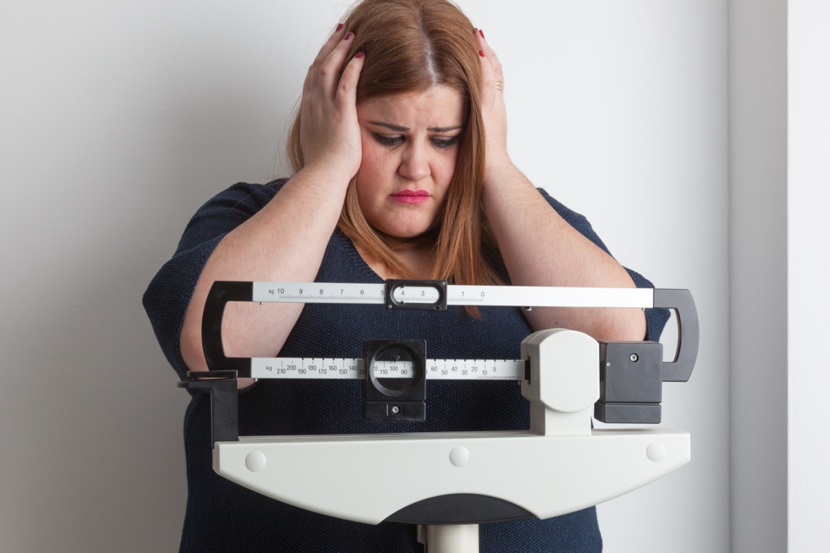 Woman obese scale