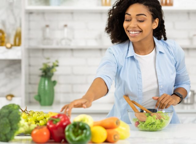 young woman making healthy meal