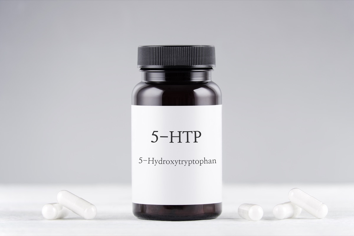 bottle of 5-htp supplement on white background