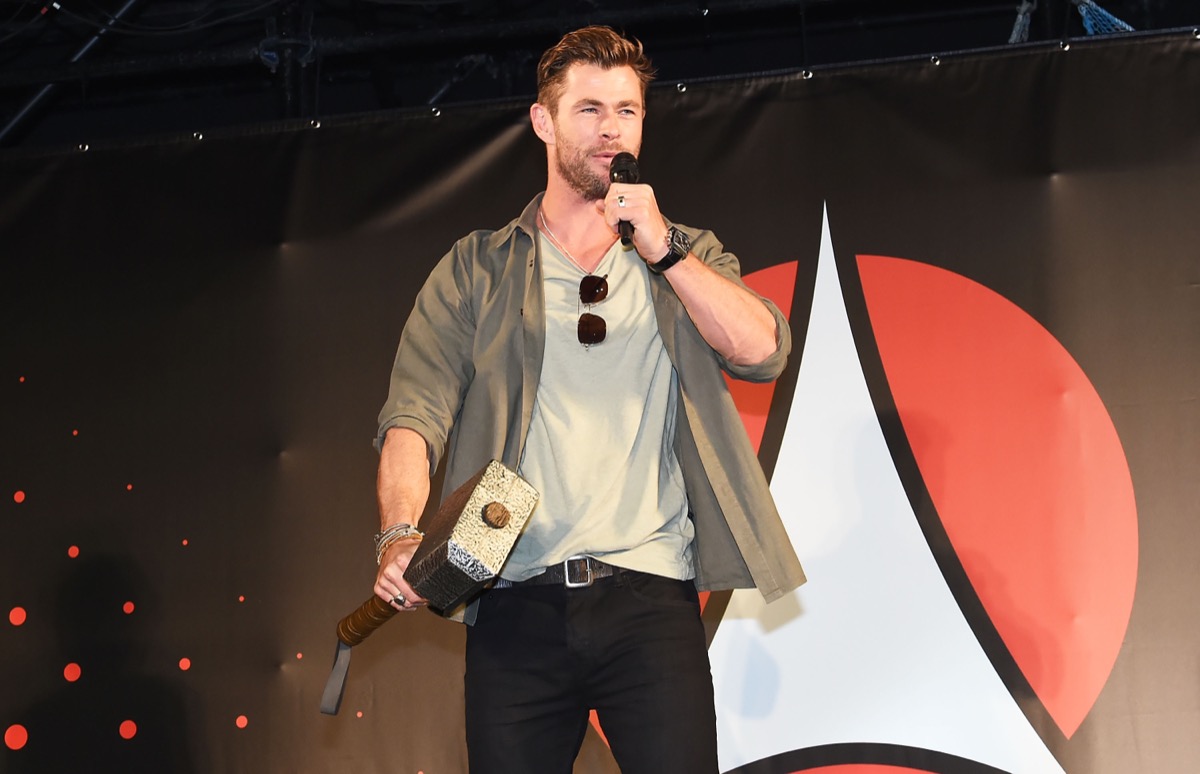 chris hemsworth holding thor's hammer