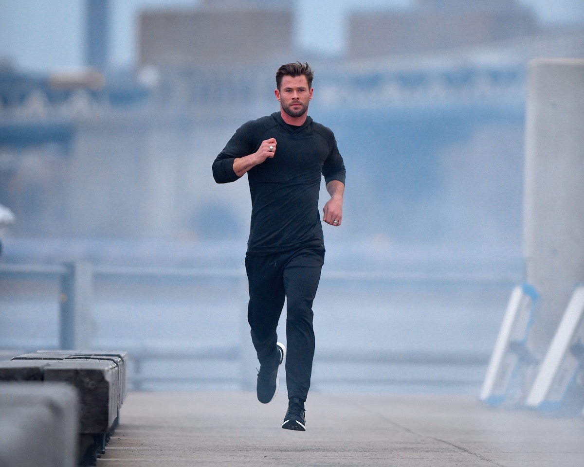 chris hemsworth running outdoors