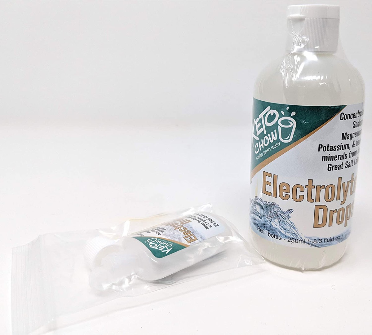 two bottles of keto chow electrolyte drops on white background