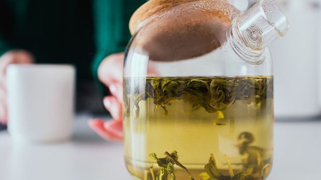 pouring green tea
