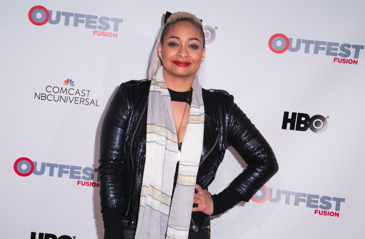 raven symone on red carpet in leather jacket