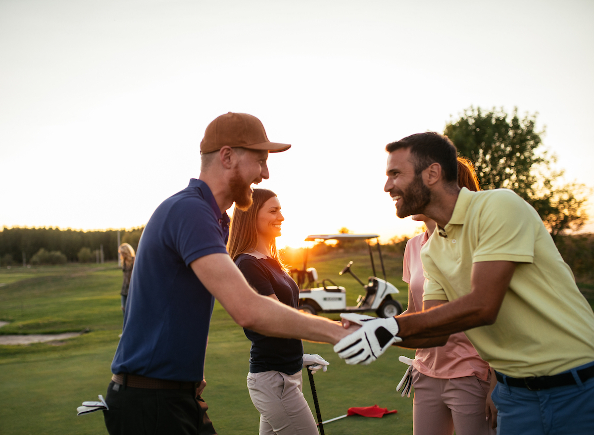 friends-shaking-hands-after-golf-game