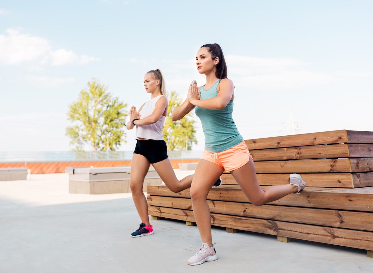 women doing bulgarian split squat exercises outside