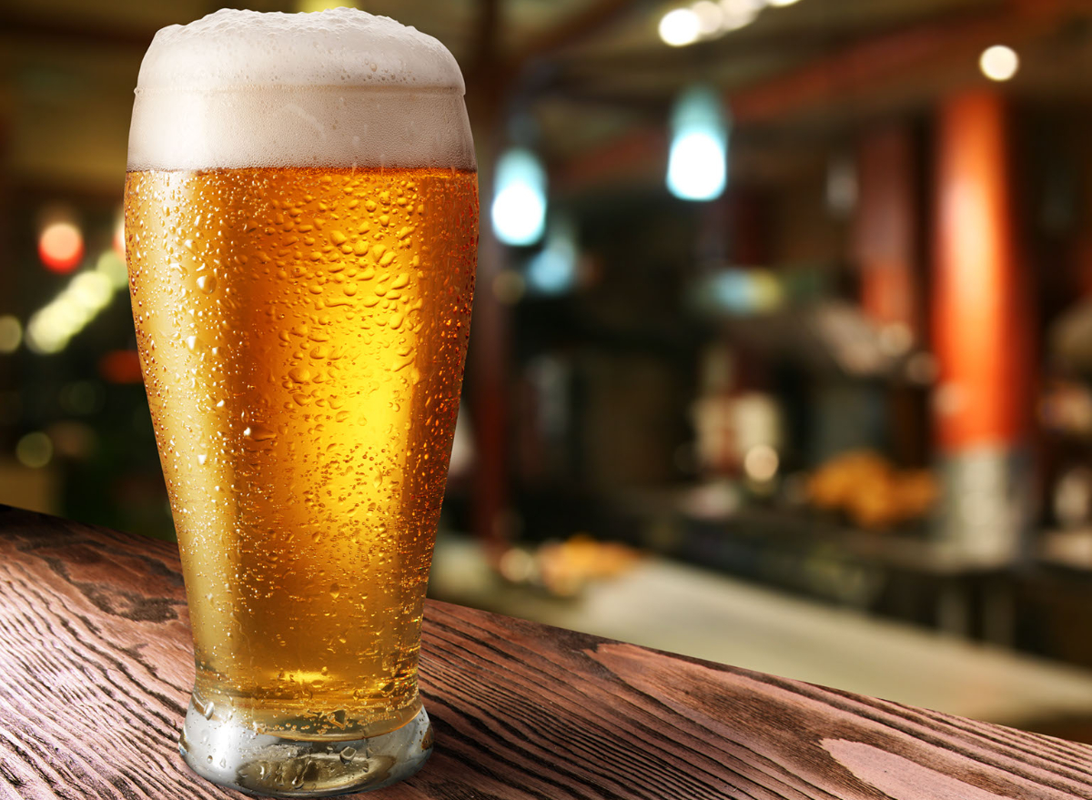 One Major Side Effect of Drinking Beer, Says Dietitian