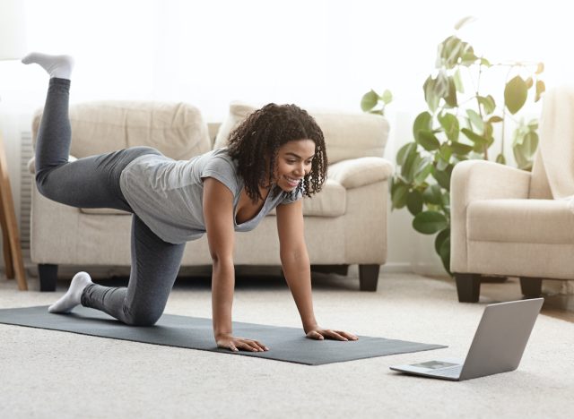 woman doing hip exercise at home