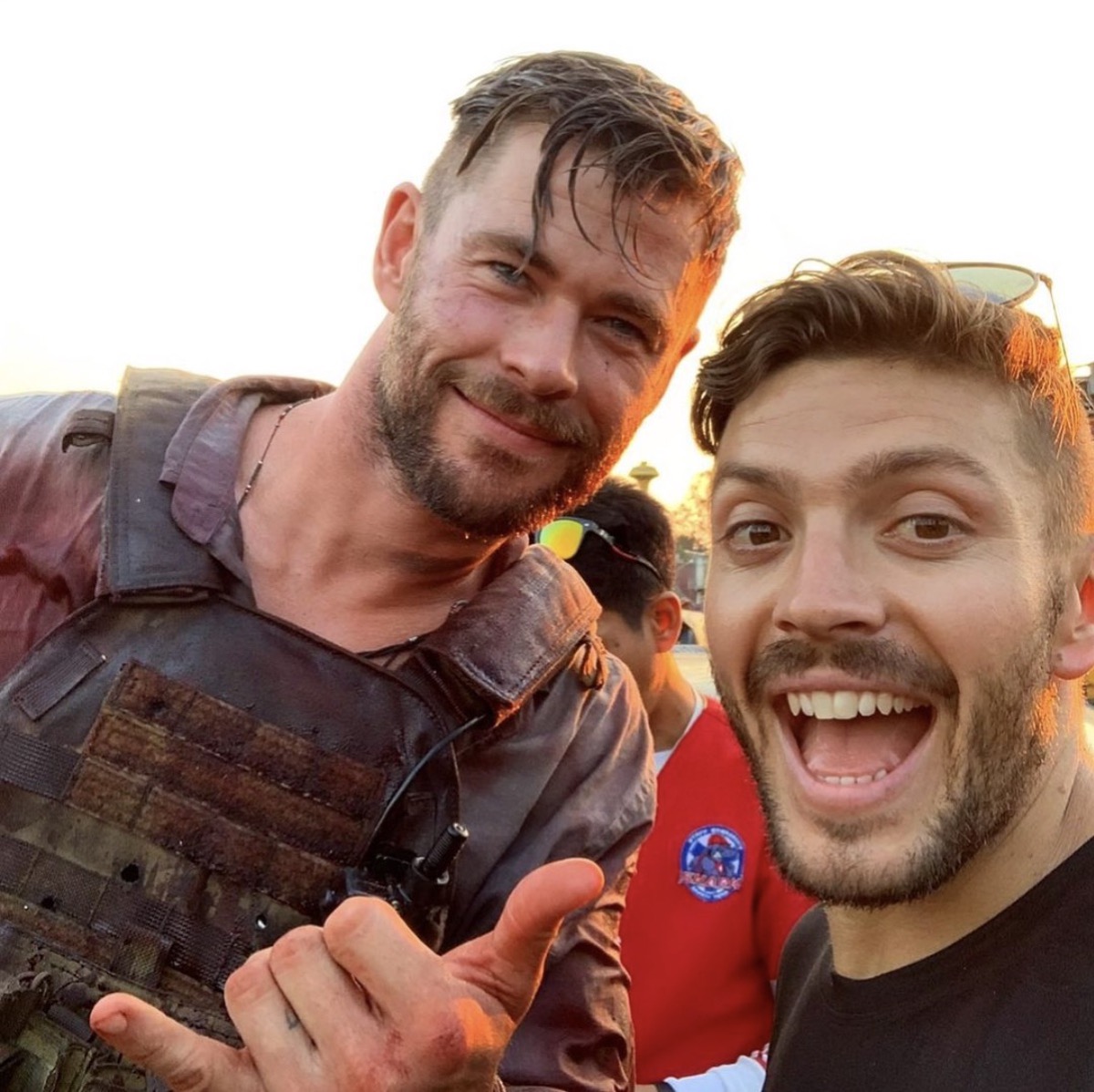 chris hemsworth and luke zocchi posing together outside in instagram screenshot