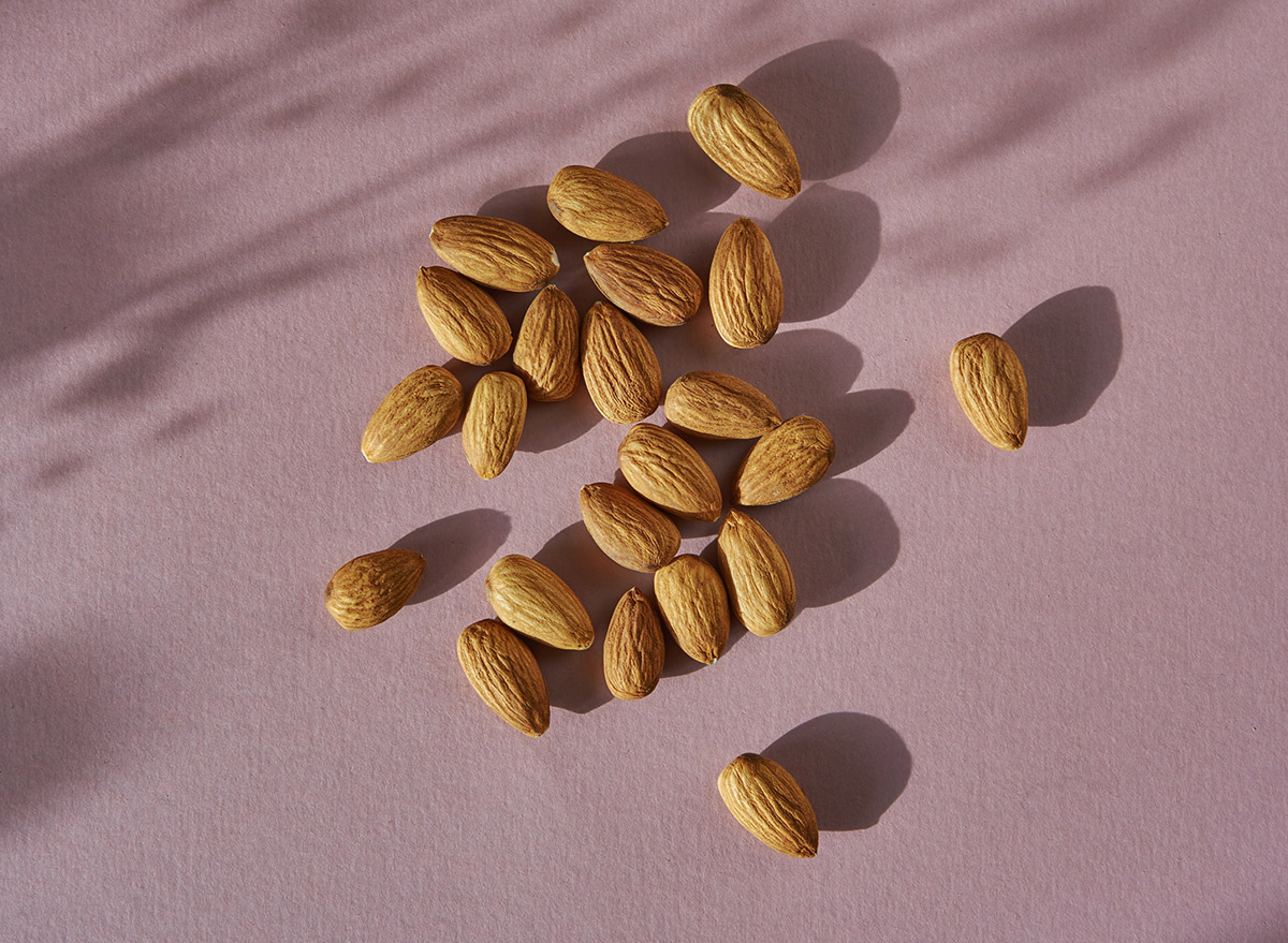 almonds on a pink table