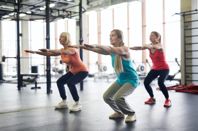 mature women doing squats
