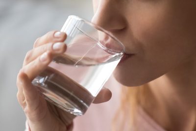 thirsty woman drinking water