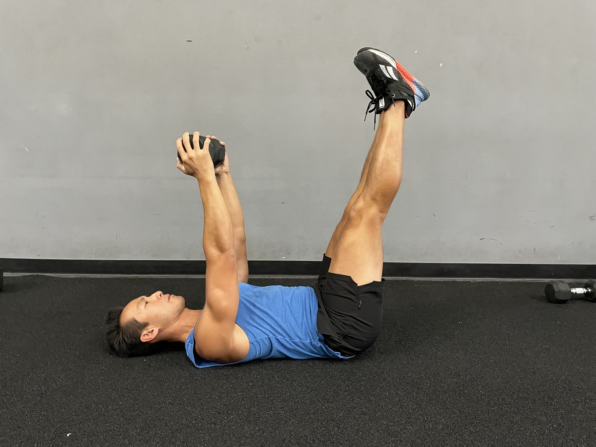Leg lift and dumbbell pullover exercise