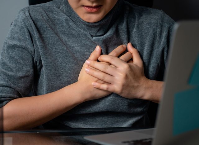 person experiencing heart attack close-up chest