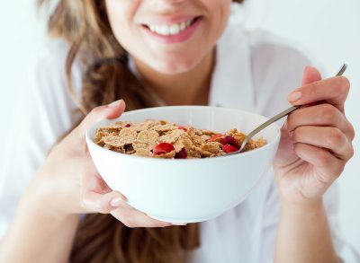 woman eating cereal