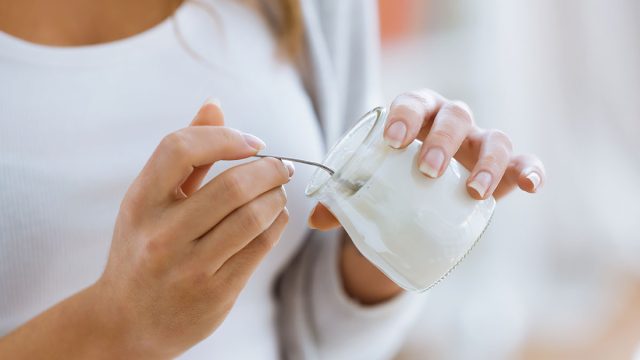 eating yogurt jar