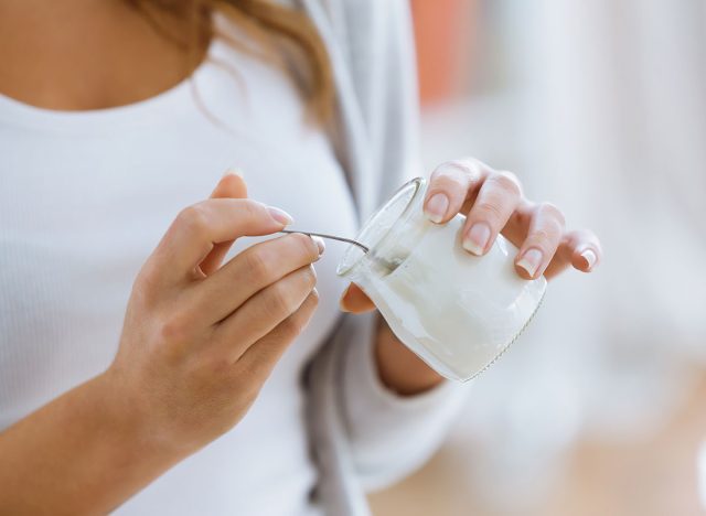 eating yogurt jar