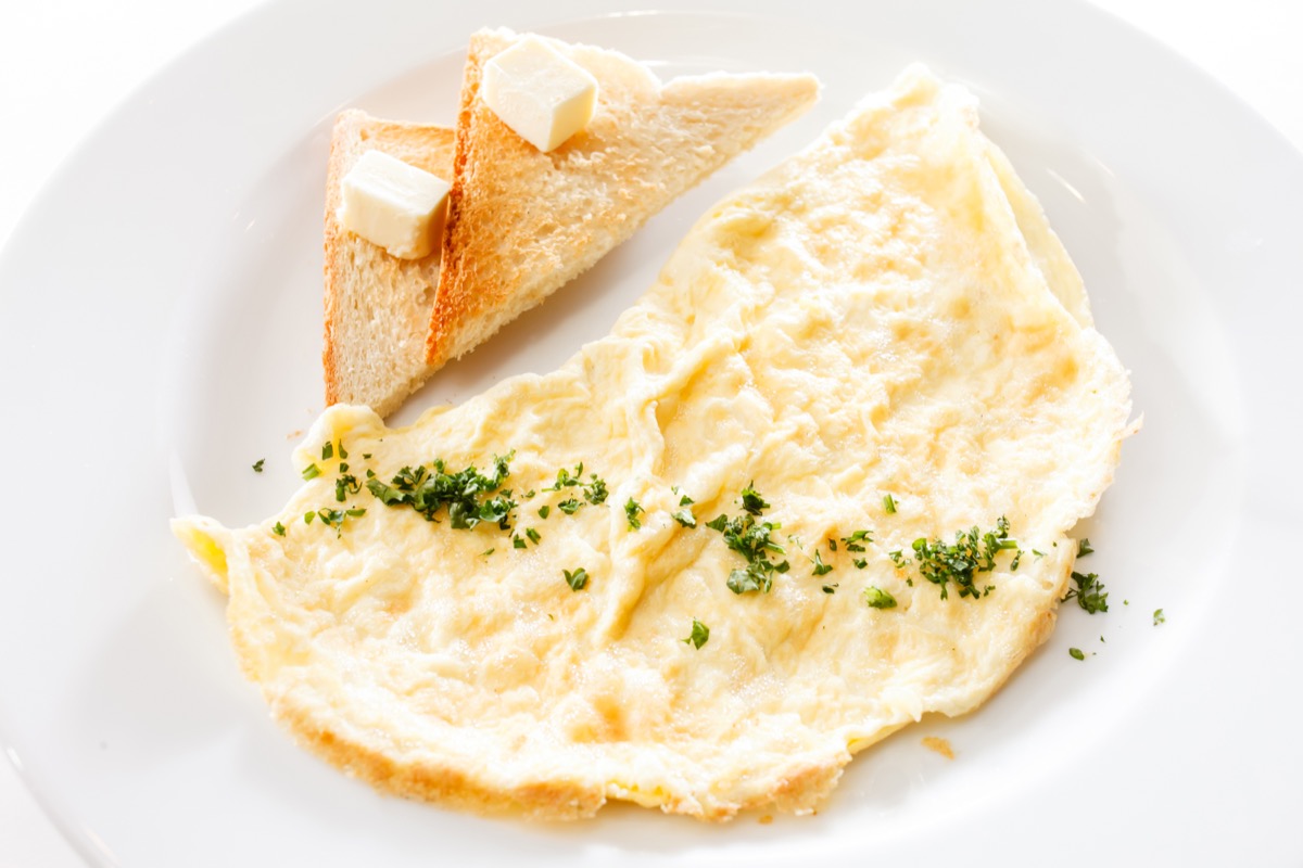 egg whites and toast on white plate